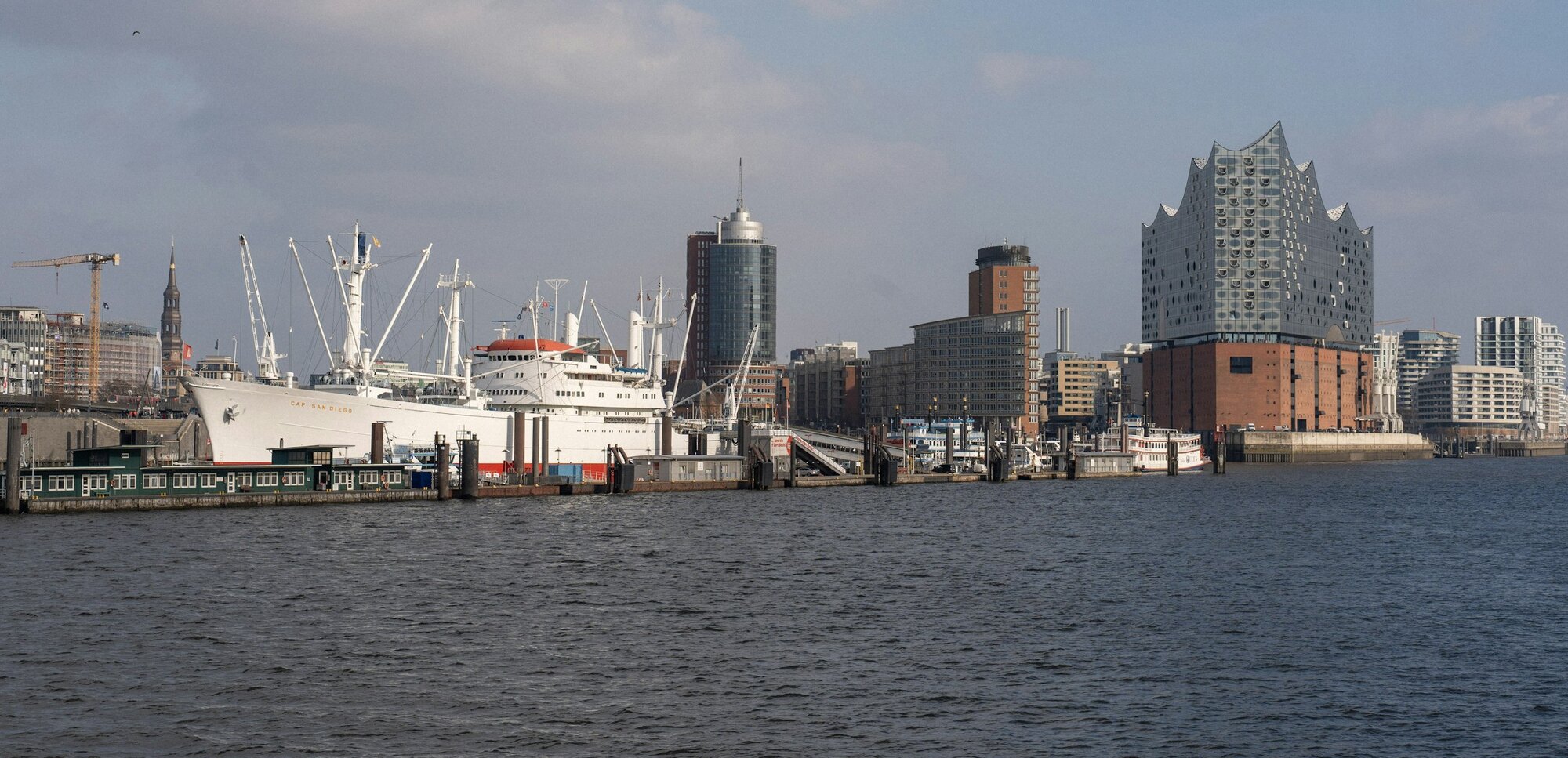 Hamburg harbour panorama with the museum ship Cap San Diego, St. Michael's church and the Elbphilharmonie